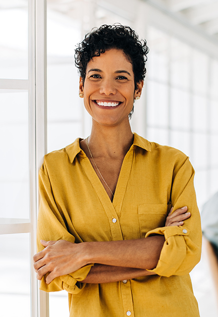 Portrait of a black business woman standing in an office